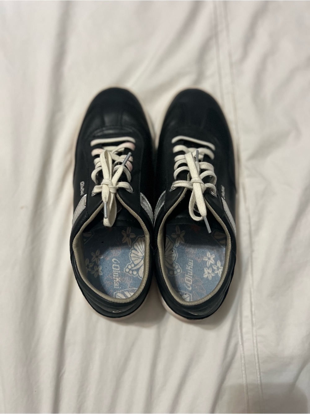 OluKai Black and Silver Women's Lace-Up Sneakers